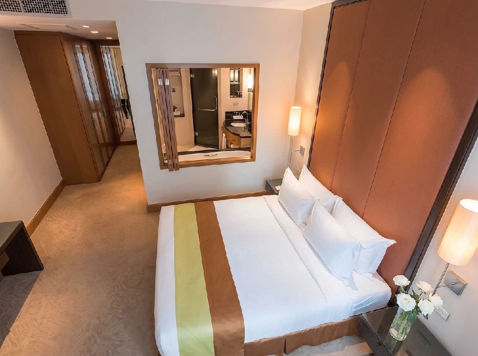Bedroom in an apartment at Ascott Sathorn Bangkok