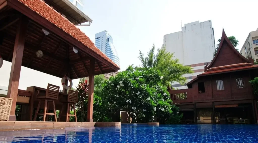 Tropical swimming pool shared by Rose Hotel and Rose Residence Bangkok