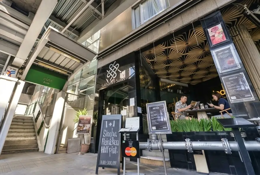 Sukhumvit Suites Hotel entrance beside Asok BTS station in Bangkok