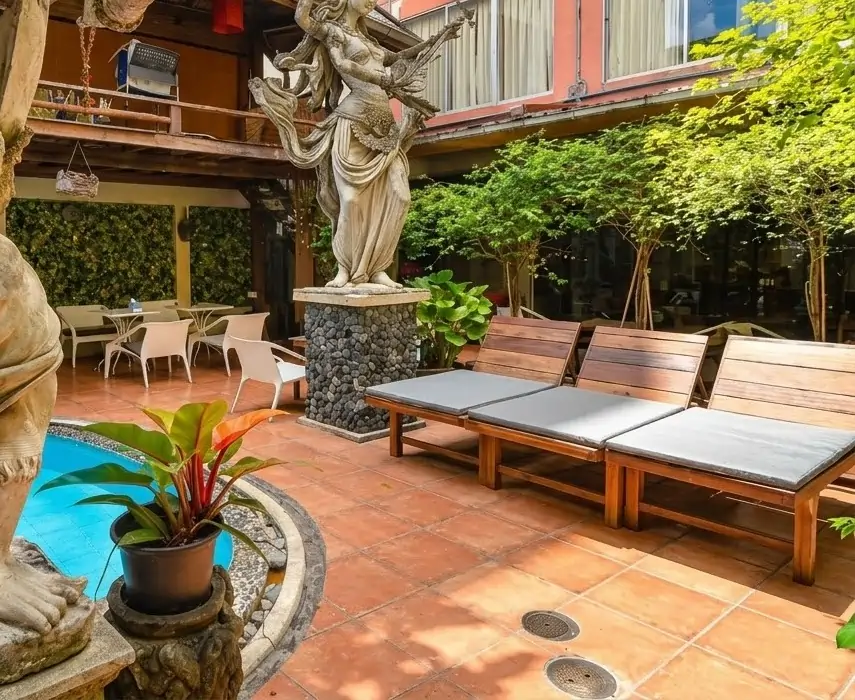 Pool courtyard and loungers at Villa Cha-Cha Banglumphu